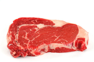 fresh raw rib eye steak on white background