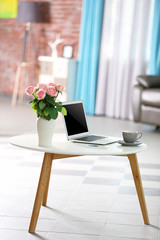 Comfortable workplace at home with laptop