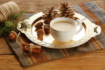 Cup of coffee on metal tray