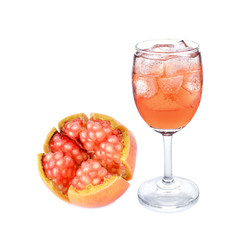 a glass of pomegranate juice on white background