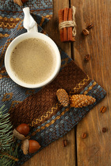 Cup of coffee on a napkin, top view