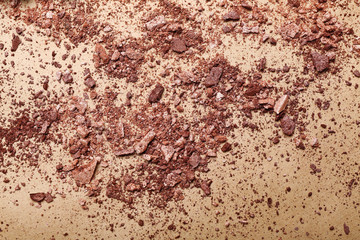 Crumbs of powder on color background