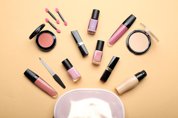 Set of decorative cosmetics on light color background