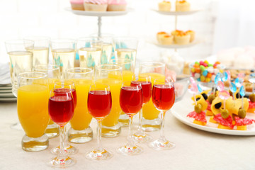 Set of cold snacks, canape, beverages and dessert, closeup