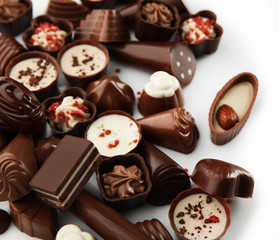 Assorted chocolate candies, close up