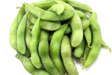 Fresh green soybeans on white background