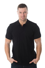 Handsome Man In Casuals Standing With Hands In Pockets