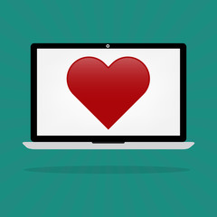 Love red hearts on laptop computer internet online dating concep