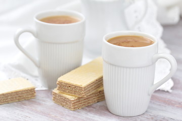 Waffles with chocolate cream and coffee