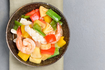 sweet and sour  sauce fried with seafood shrimp squid , asian ch
