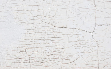 White wall with cracks
