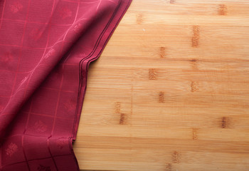 Red rablecloth on the wooden table