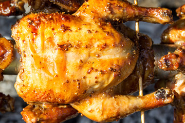 Grilled chicken in the market, selective focus