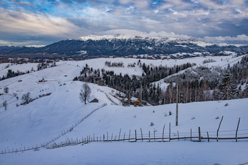 Fototapeta na wymiar Winter landscape in a romanian village - Magura