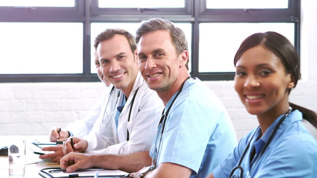 Smiling medical team in a meeting