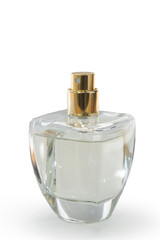 Glass perfume bottle on white background