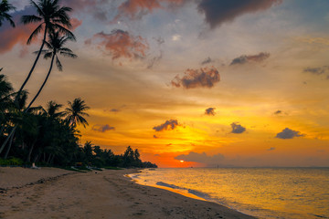 Sunset on the beach of Bang Por on Koh Samui in Thailand