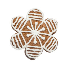 Gingerbread cookie made in the shape of a Christmas star (snowflake) isolated on the white