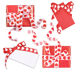 Set of perfectly packed two gifts box and cards with bow from ribbon hearts for St. Valentine's Day on the white