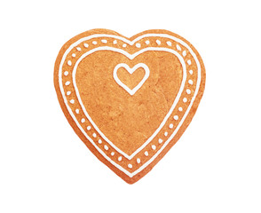 Handmade heart shaped gingerbread cookie isolated on white background