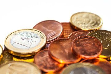 Few Euro coins isolated on white background