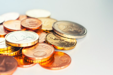 Few Euro coins isolated on white background