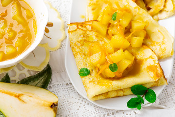  pancakes with orange  and pears sauce