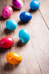 Easter egg on wooden background.