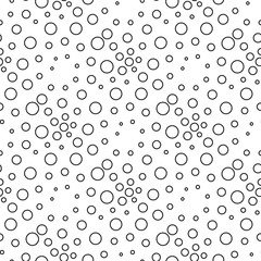 seamless vector background of bubbles of different sizes.