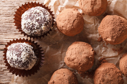 Chocolate truffles close-up in a rustic style. horizontal top view
