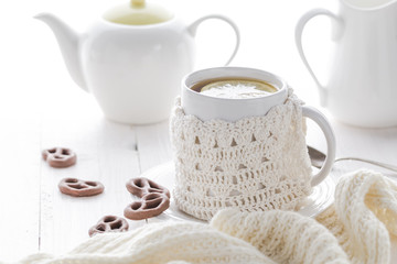 Cup hot tea winter evening