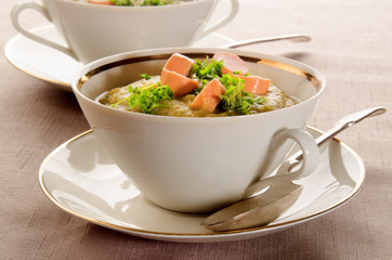 potato soup with sliced vienna sausages and parsley