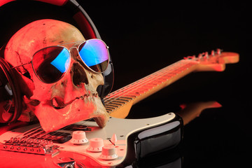 Still life with skull and electric guitar
