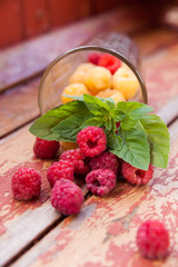 Red raspberries in   glass