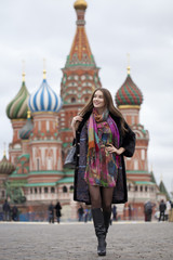 Obraz premium Young woman in a mink coat on the Red Square in Moscow