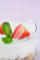 Yogurt with cereals and strawberries
