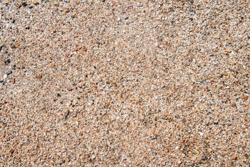 Sand Texture. Brown sand. Background from fine sand. Sand background