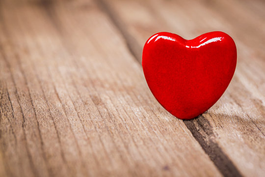 Valentines heart on wooden background