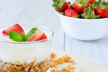 Yogurt with cereals and strawberries