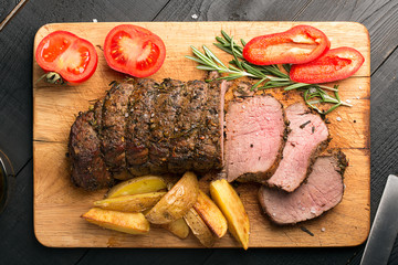 Grilled beef on a cutting board