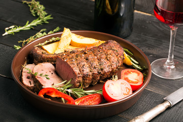 Grilled beef on a cutting board