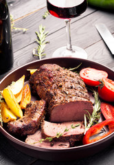 Grilled beef on a cutting board