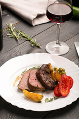 Grilled beef on a cutting board