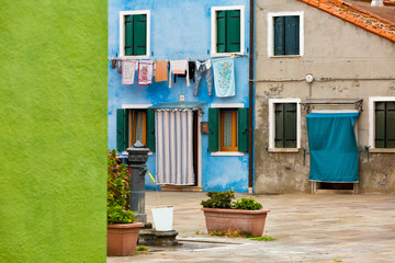 Fototapeta na wymiar Colorful houses on Burano island, near Venice, Italy