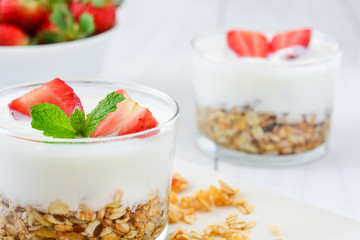 Yogurt with cereals and strawberries