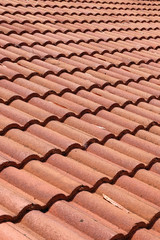 brown tile roof weathered on building residential