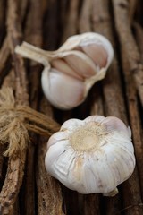 Fresh garlic on wooden background