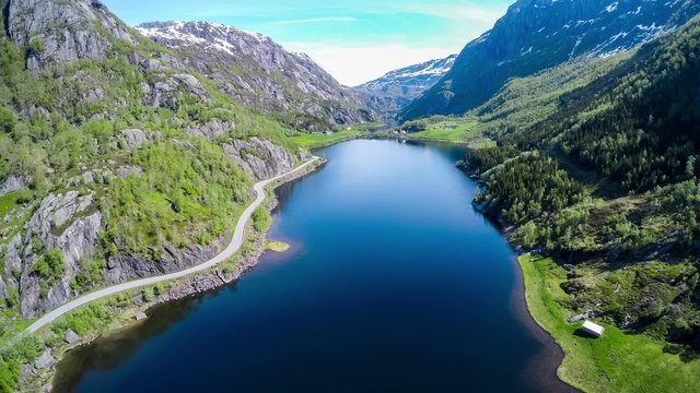 Aerial footage Beautiful Nature Norway. Flying over the lakes and fjords.View from the bird's-eye view.
