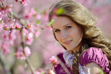 young woman portrait outdoor in spring