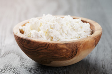 fresh ricotta in olive wood bowl